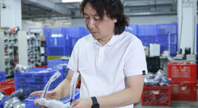 Janson (ASG CEO) on the QC inspection floor — operational evidence beats policy claims when vetting scaling-stage agents