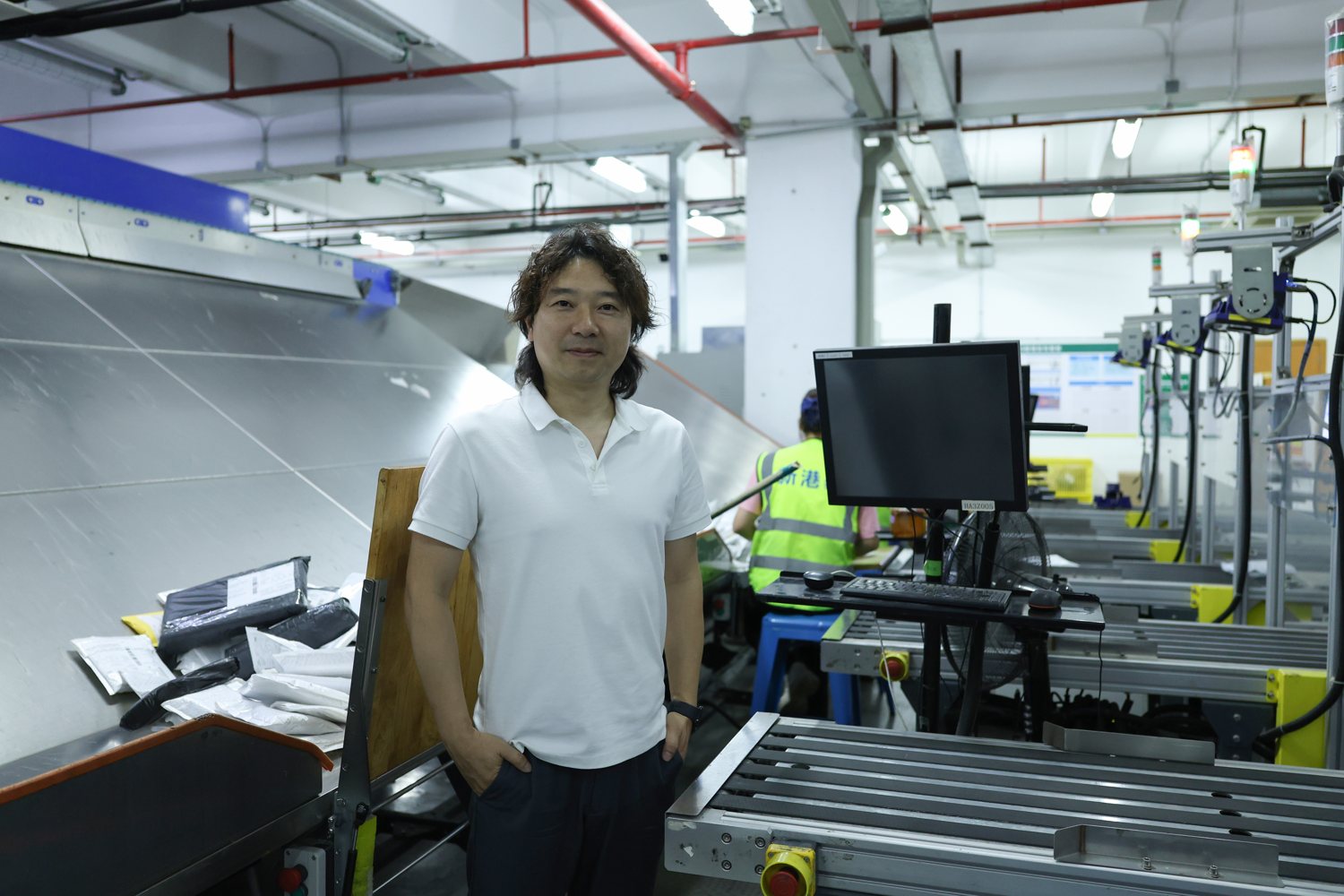 Janson Wang on the ASG operations floor — the first-party environment behind these standards.