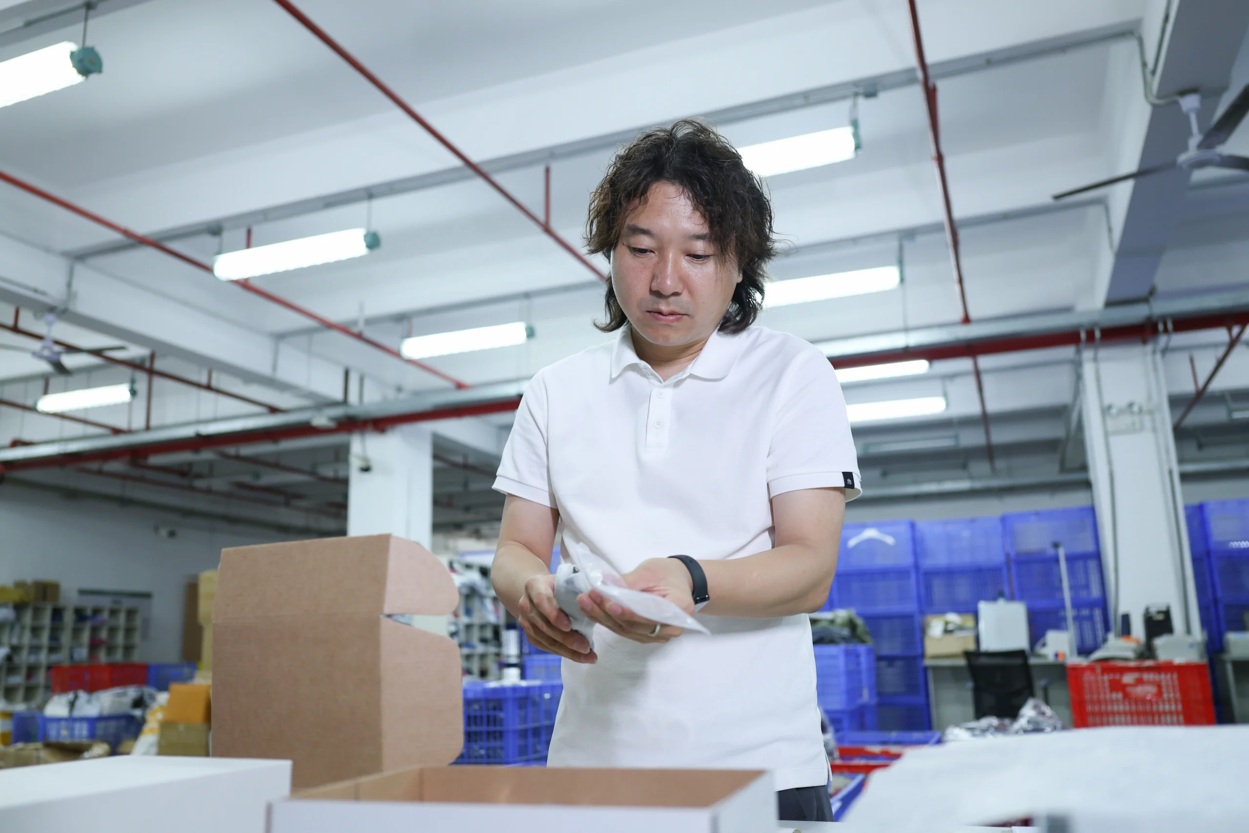 Packaging review ASG team member checking a packaging sample