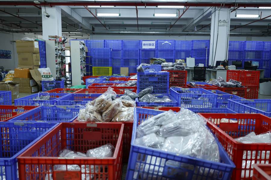 Bagged units in red and blue warehouse baskets