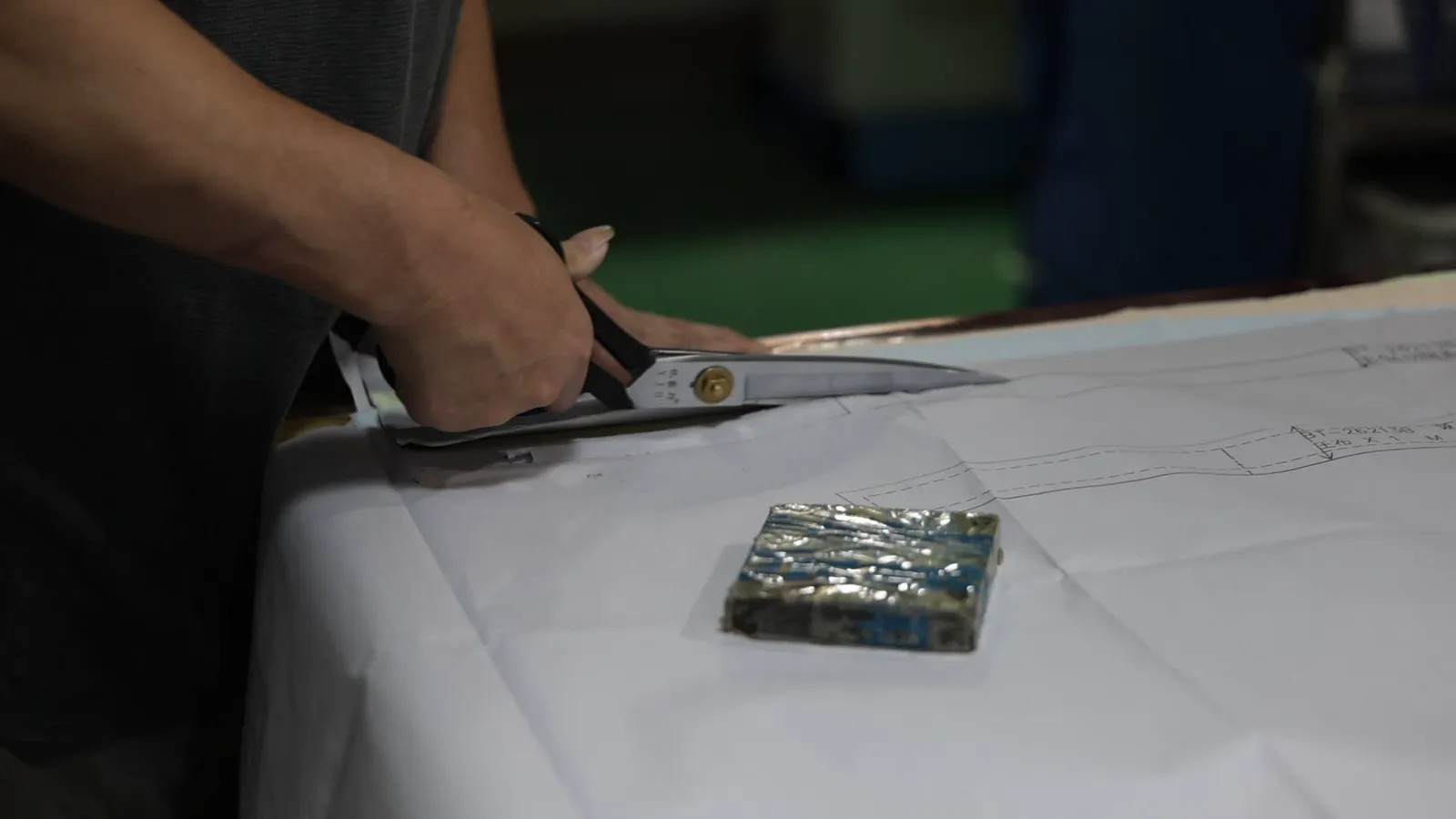 Cutting fabric against a reference swatch