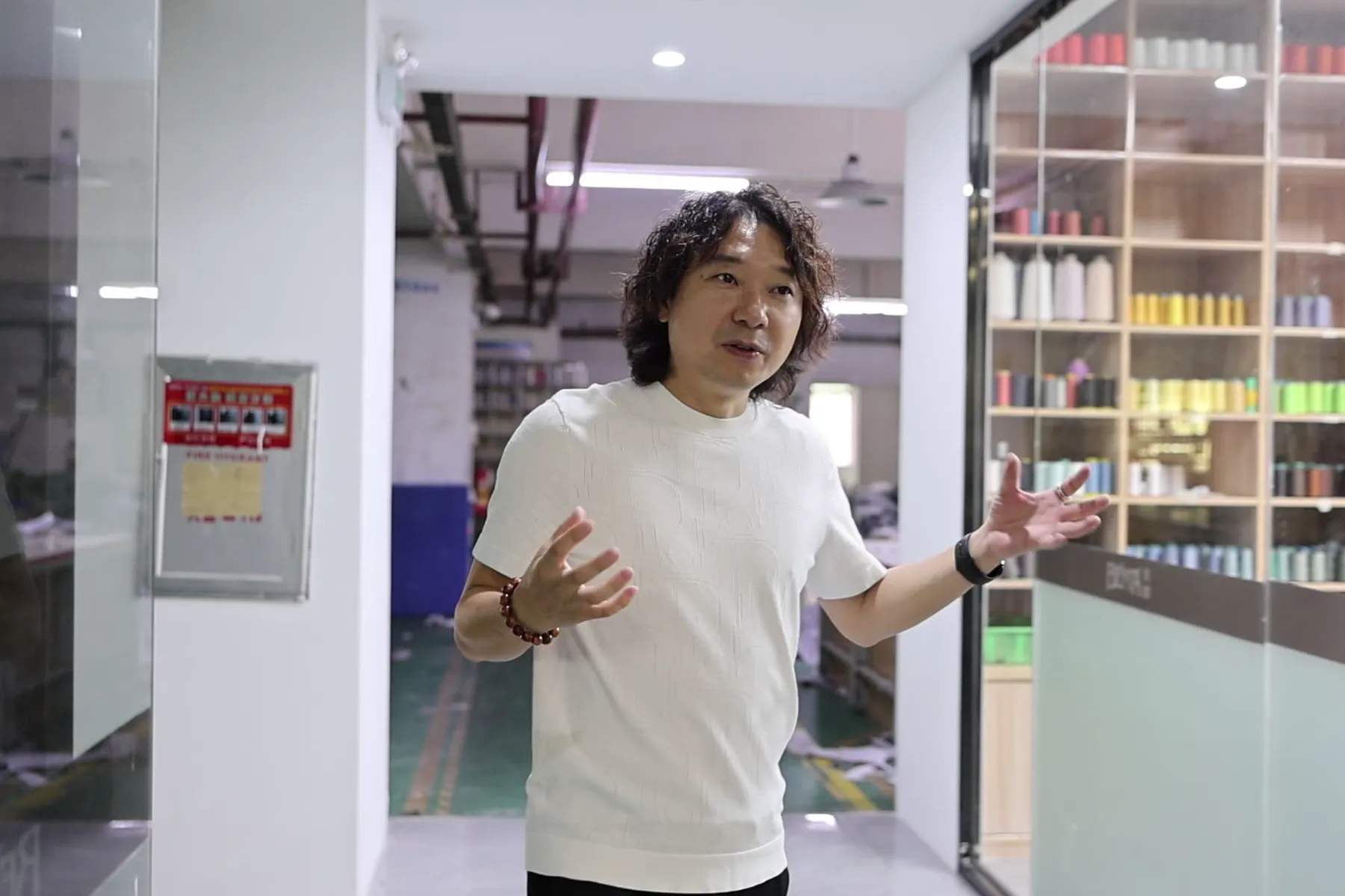 Founder Janson Wang at a partner garment factory