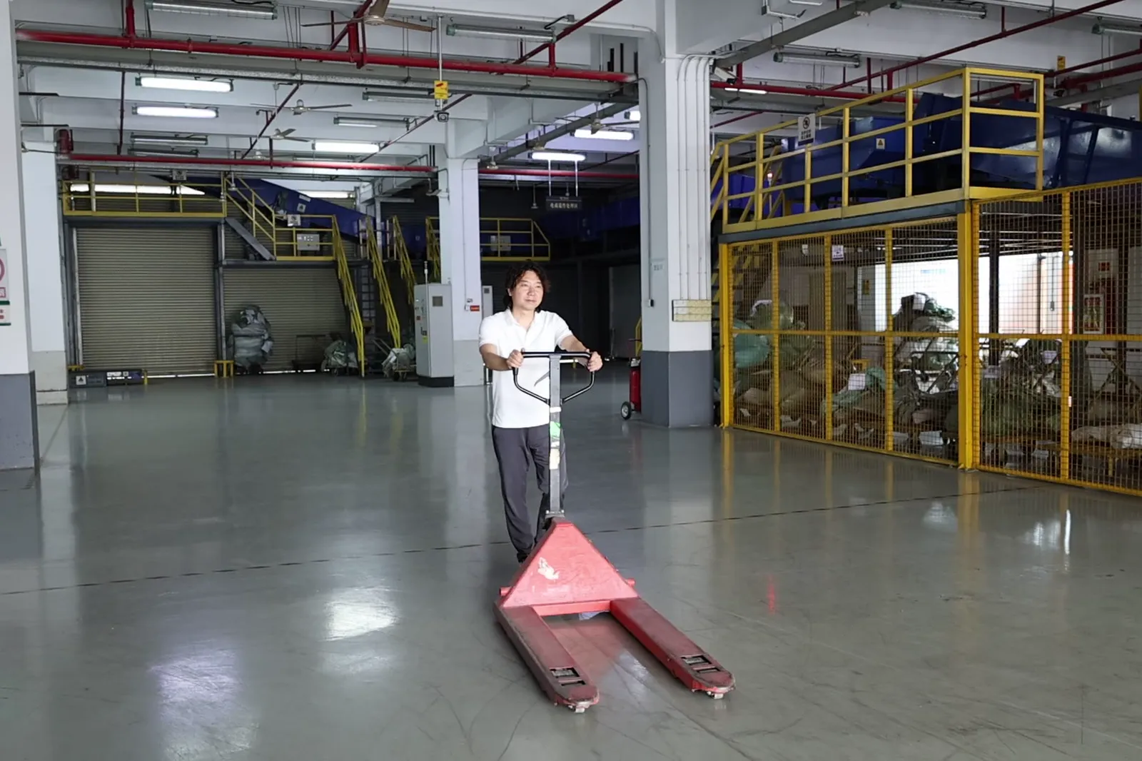 ASG warehouse operator handling a parcel
