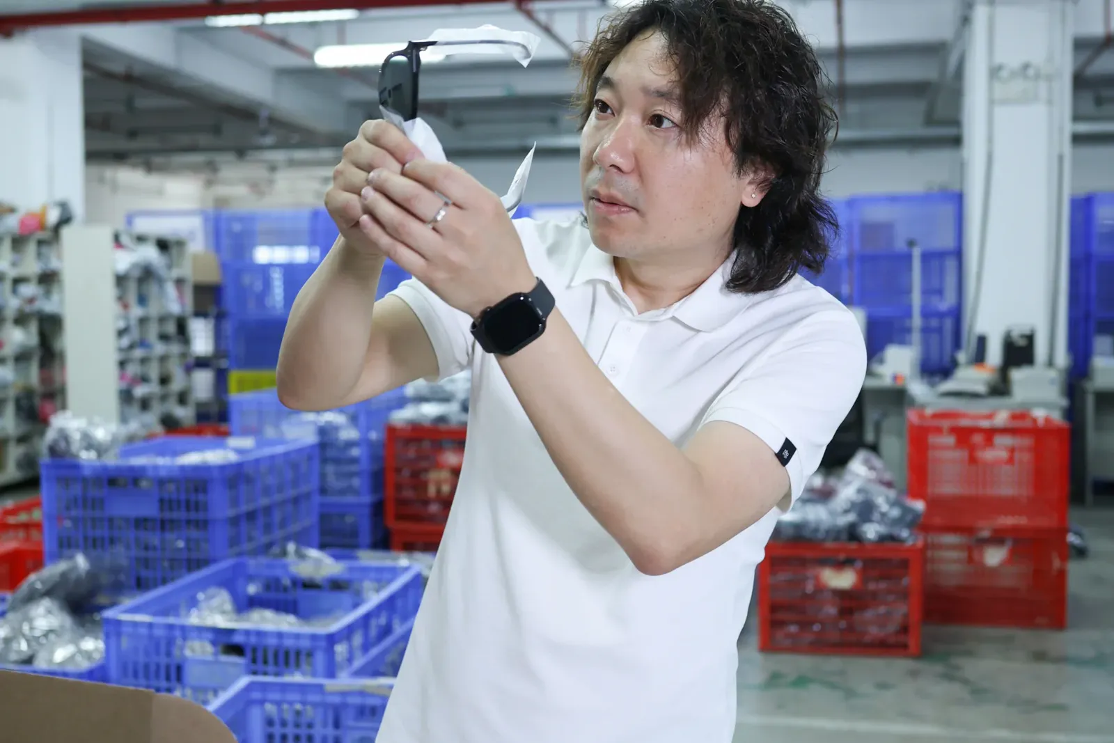 ASG team member performing a product quality inspection