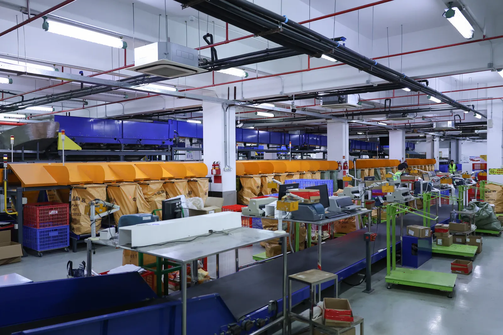 Rows of pack stations in the ASG warehouse