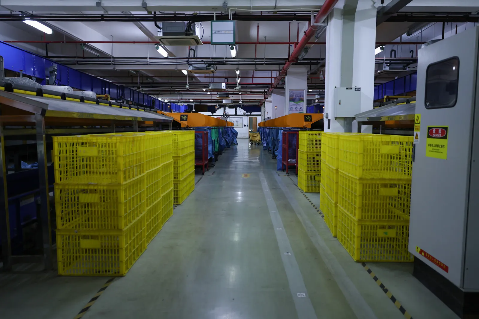 Aisle of sorting totes in the ASG warehouse