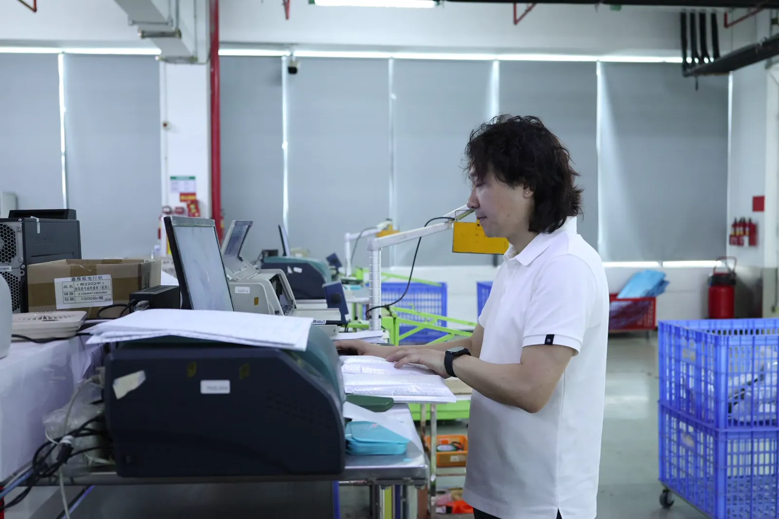 Order records being checked at an ASG warehouse desk