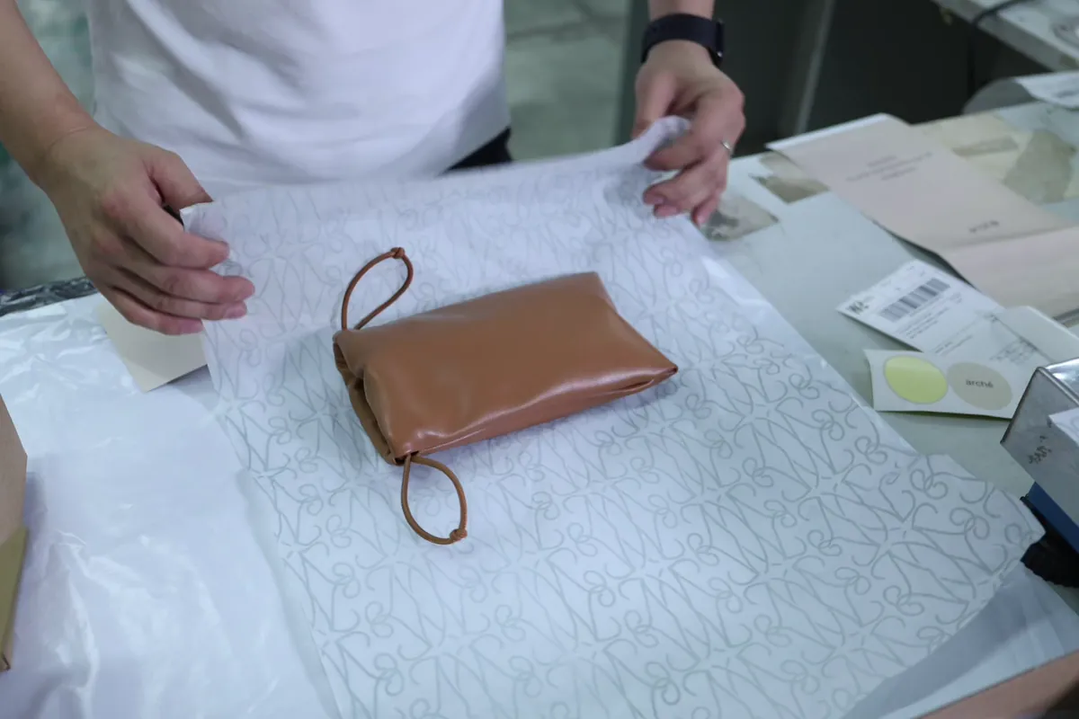 Product laid on branded tissue before packing