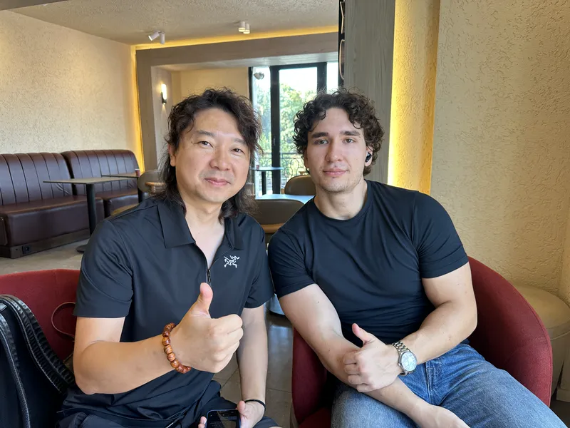 Founder Janson Wang with a client after a meeting