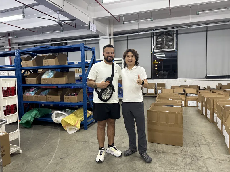 A client visiting the ASG warehouse with founder Janson Wang